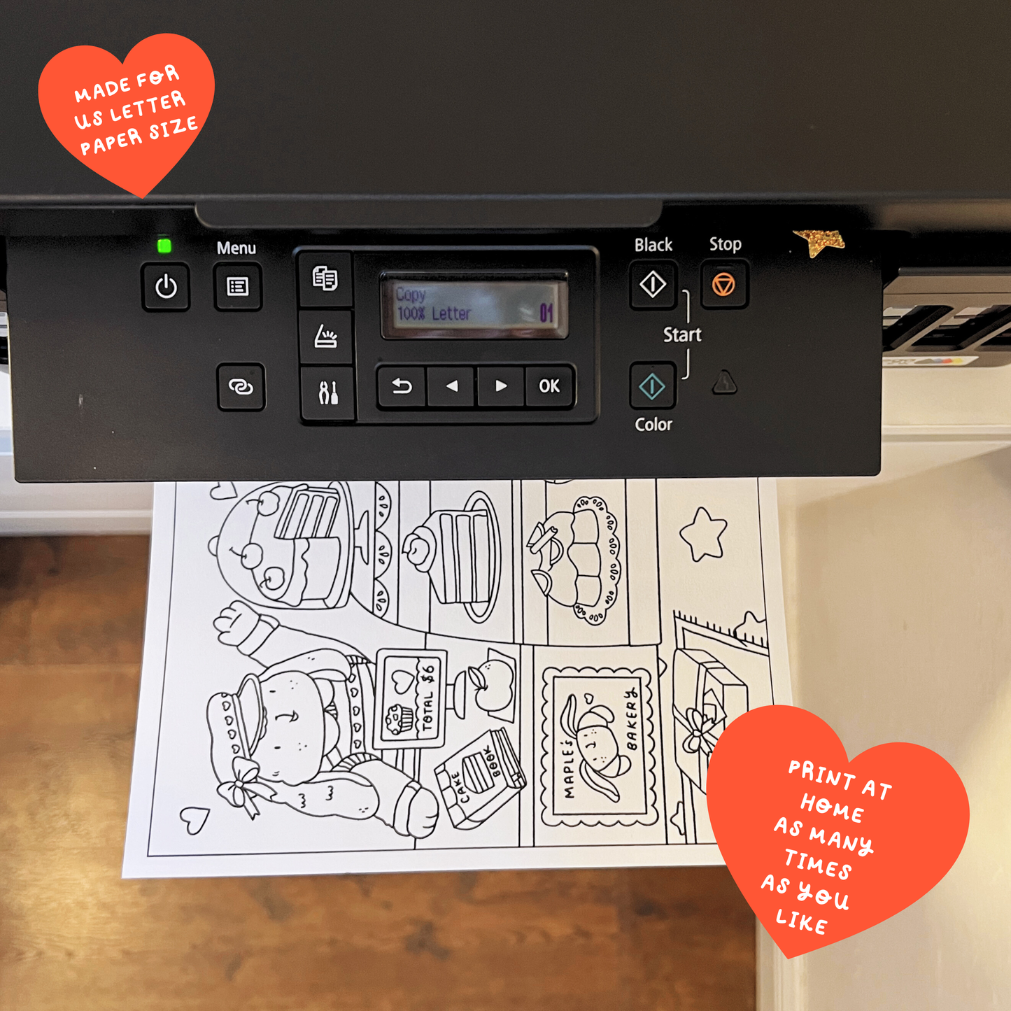 Printer with a coloring book page on a wooden surface, surrounded by decorative hearts with text that reads "Print at home as many times as you like" and "Made for US Letter paper size".